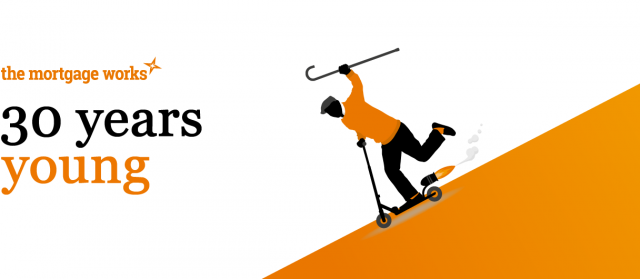 The Mortgage Works branded merchandise including mugs, pens, and notebooks in orange and black design.