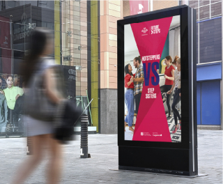 Outdoor advertisement for the 'Future Steps' challenge featuring 'Me vs 10K Steps' with images of people participating in the challenge.