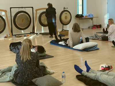 mark-makers prepare themselves for the gong bath